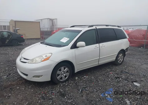 2009 Toyota Sienna Xle z USA, uszkodzony, nr VIN 5TDZK22CX9S252031